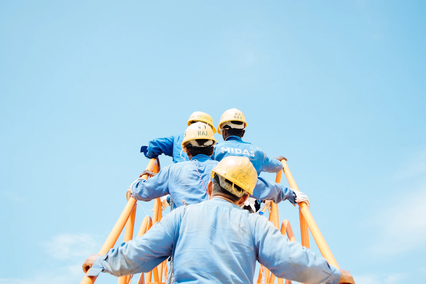Placeholder photograph of site crew in hard hats