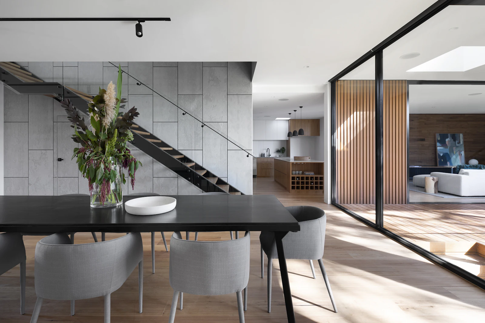 Placeholder photograph of a dark interior with an open stair