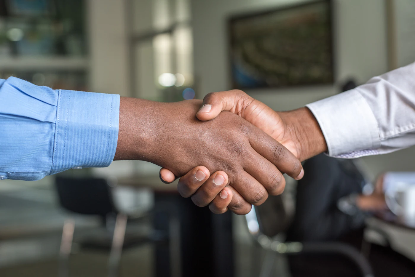 Placeholder photograph of a handshake